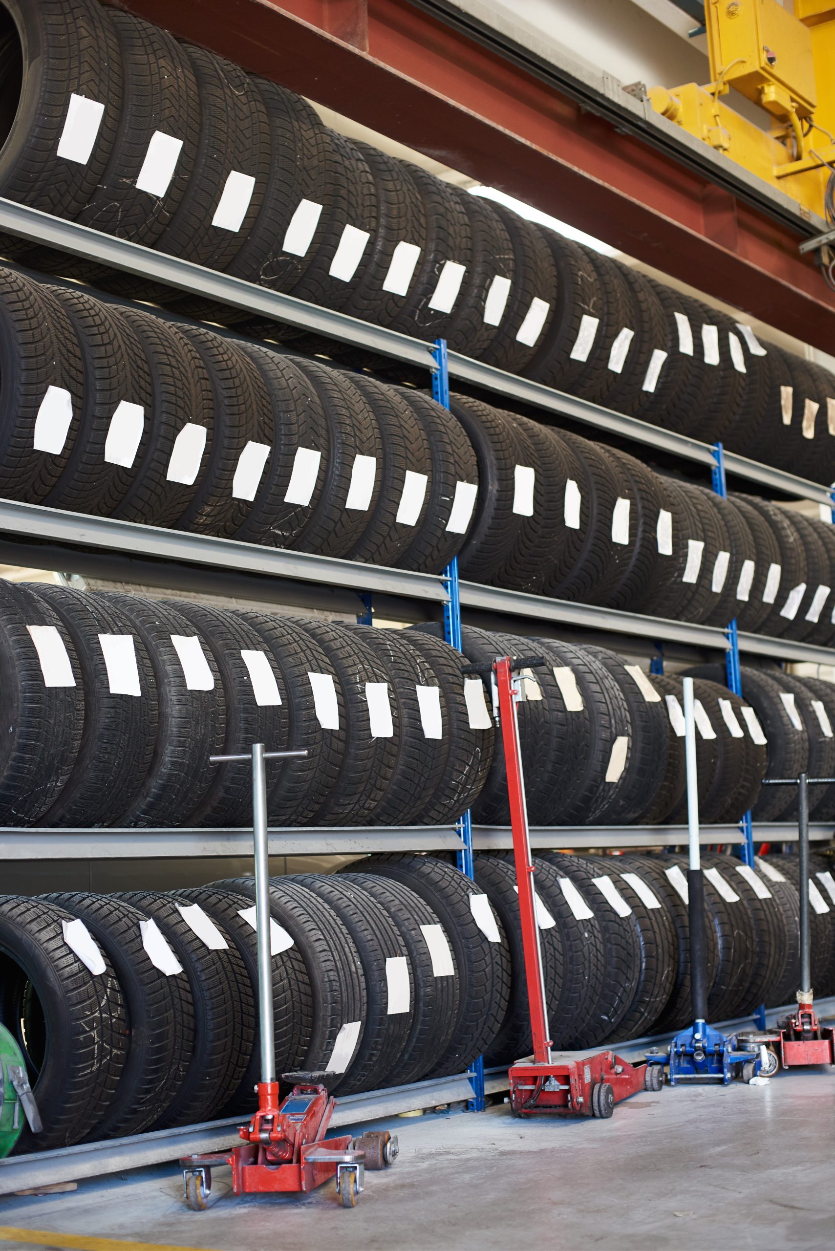 shelves with many care tires at warehouse 2023 11 27 05 13 00 utc scaled